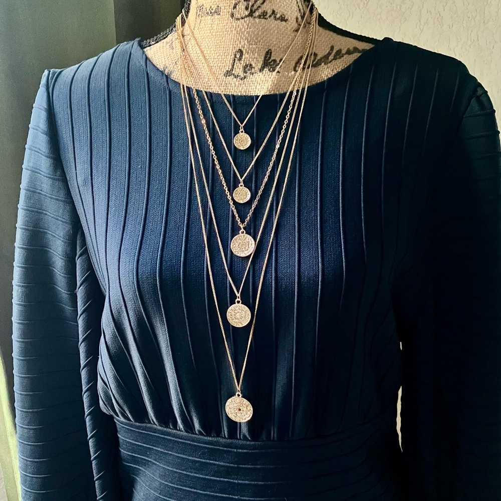 Gold medallion layered necklace and earrings